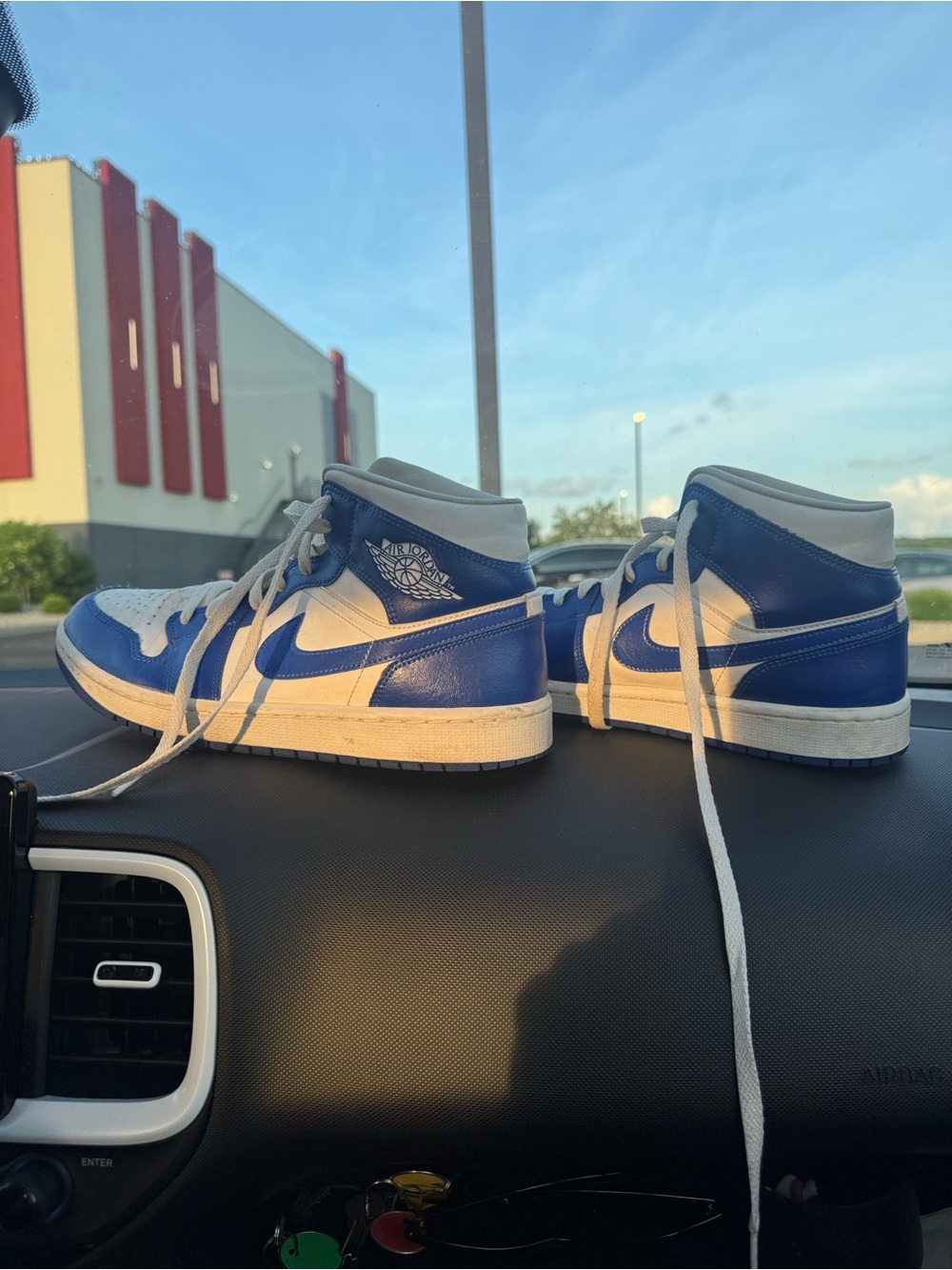 Nike Men’s Mid-Top Sneakers in White and Blue